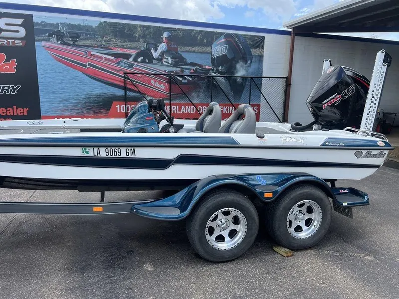 Slide: The Image of 2021 Bass Cat Pantera II boat on trailer, parked outside dealership. - 35