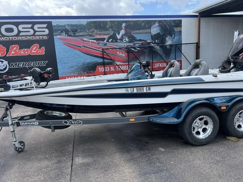 Slide: The Image of 2021 Bass Cat Pantera II boat on trailer, parked outside dealership. - 36