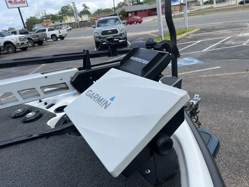 Slide: The Image of 2021 Bass Cat Pantera II with Garmin and Humminbird electronics in a parking lot. - 44