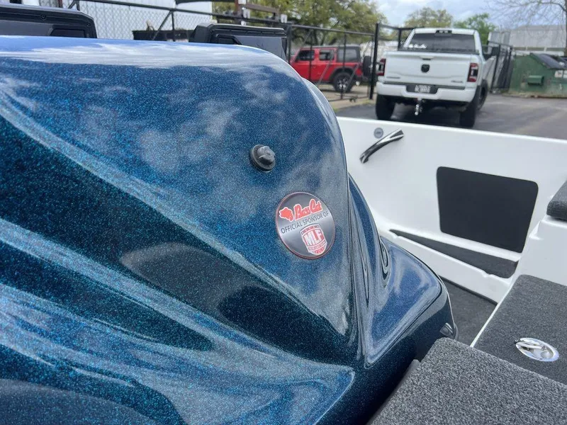 Slide: The Image of 2021 Bass Cat Pantera II boat with metallic blue finish and sponsor sticker. - 49