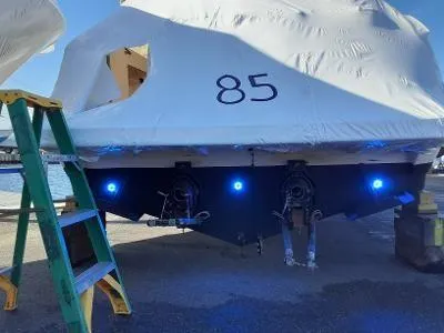 Slide: The Image of 2005 Sea Ray 290 Amberjack boat with protective cover and blue underwater lights. - 9