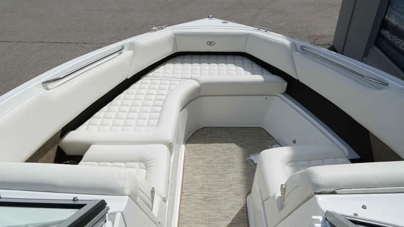 Slide: The Image of 2019 Cobalt R7 boat interior with white cushioned seating and stainless steel handrails. - 15
