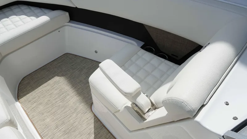 Slide: The Image of Luxurious white seating in 2019 Cobalt R7 boat interior. - 17