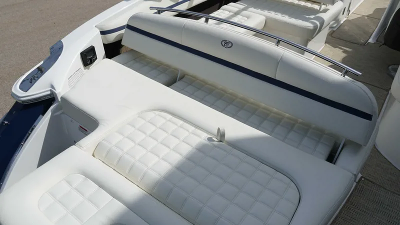 Slide: The Image of 2019 Cobalt R7 boat with white cushioned seating and sleek design. - 9