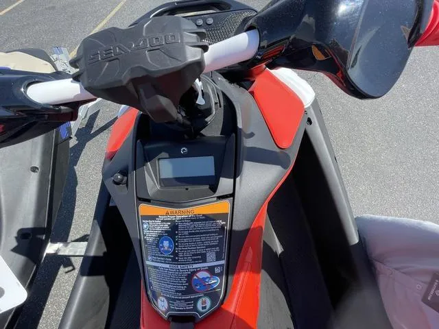 Slide: The Image of 2025 Sea-Doo Waverunner Spark Trixx dashboard and controls, close-up view. - 10