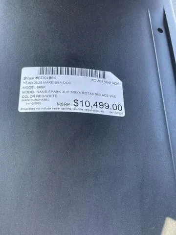 Slide: The Image of 2025 Sea-Doo Spark Trixx price tag, MSRP $10,499, red/white color, model details visible. - 14