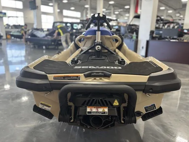 Slide: The Image of 2025 Sea-Doo Waverunner Wake in showroom, rear view showcasing design and features. - 14