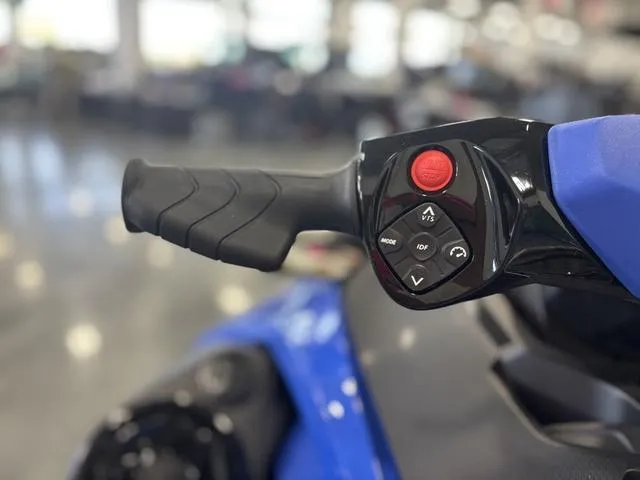 Slide: The Image of 2025 Sea-Doo Waverunner Wake in showroom, featuring sleek design and blue accents. - 3