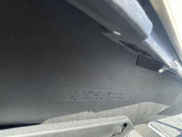 Slide: The Image of 2025 Sea-Doo Waverunner Spark Trixx hull detail, showcasing model and design features. - 2