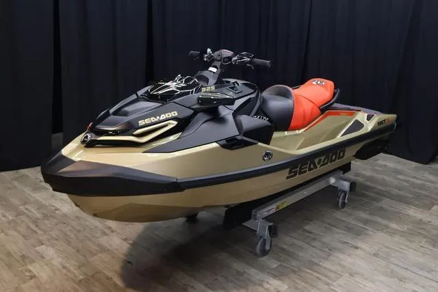 Slide: The Image of 2025 Sea-Doo Waverunner RXT-X in showroom, featuring sleek design and vibrant colors. - 15