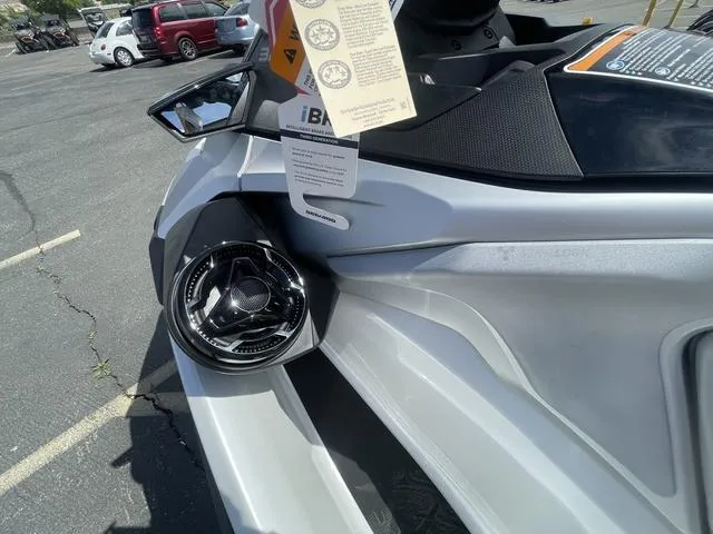 Slide: The Image of 2025 Sea-Doo Waverunner GTX in a parking lot, showcasing sleek design and details. - 10