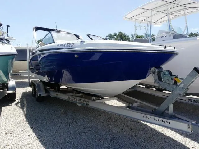 Slide: The Image of 2023 Hurricane 235SD boat silhouette with "Photos Coming Soon" text. - 1