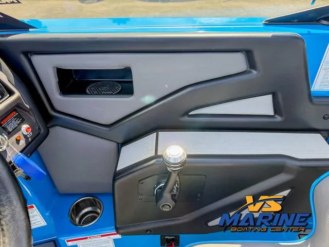 Slide: The Image of 2022 Moomba Makai boat interior with control panel and VS Marine logo. - 19