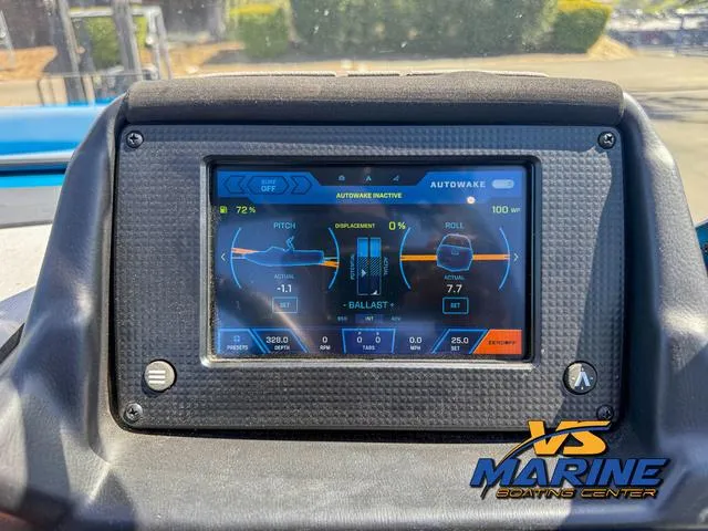 Slide: The Image of 2022 Moomba Makai dashboard display showing Autowake system and ballast settings. - 22