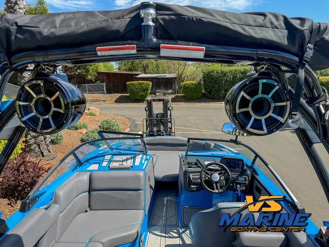 Slide: The Image of 2022 Moomba Makai boat interior with speakers and seating, showcased at VS Marine Boating Center. - 27