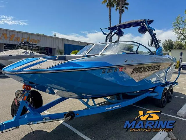 Slide: The Image of 2022 Moomba Makai boat in blue on trailer at VS Marine Boating Center. - 4