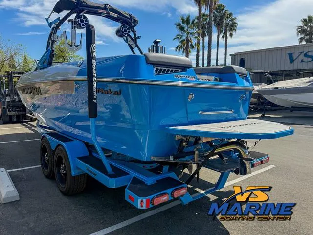 Slide: The Image of 2022 Moomba Makai boat in vibrant blue at VS Marine Boating Center. - 6