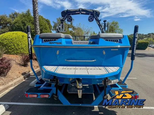 Slide: The Image of 2022 Moomba Makai boat, blue, rear view, parked at VS Marine Boating Center. - 7
