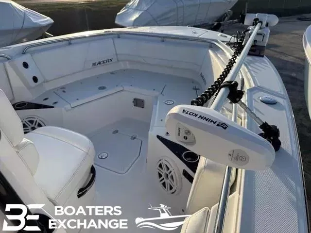 Slide: The Image of 2020 Blackfin 242CC boat interior with Minn Kota trolling motor, showcased by Boaters Exchange. - 10