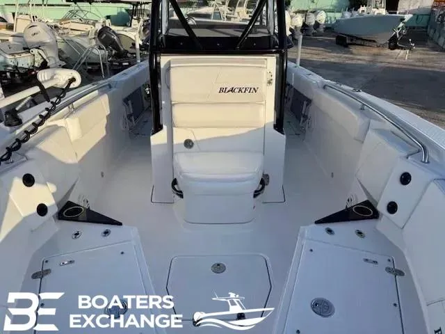 Slide: The Image of 2020 Blackfin 242CC boat interior with seating and storage, displayed at Boaters Exchange. - 8