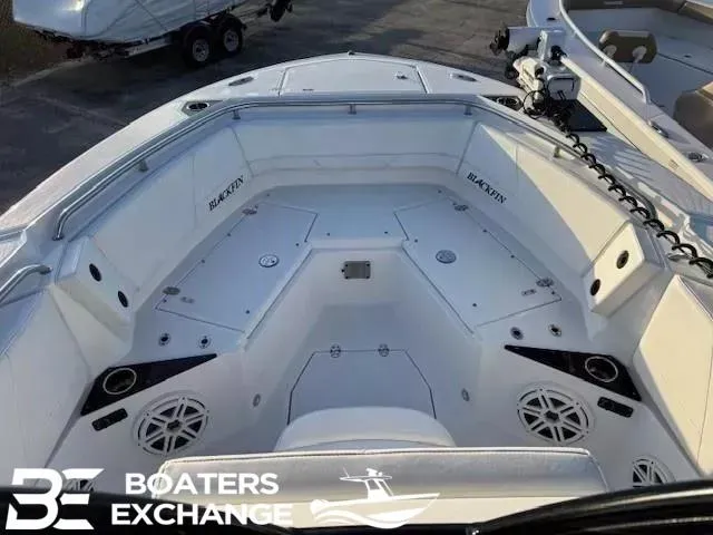 Slide: The Image of 2020 Blackfin 242CC boat interior with seating and storage compartments, displayed at Boaters Exchange. - 9