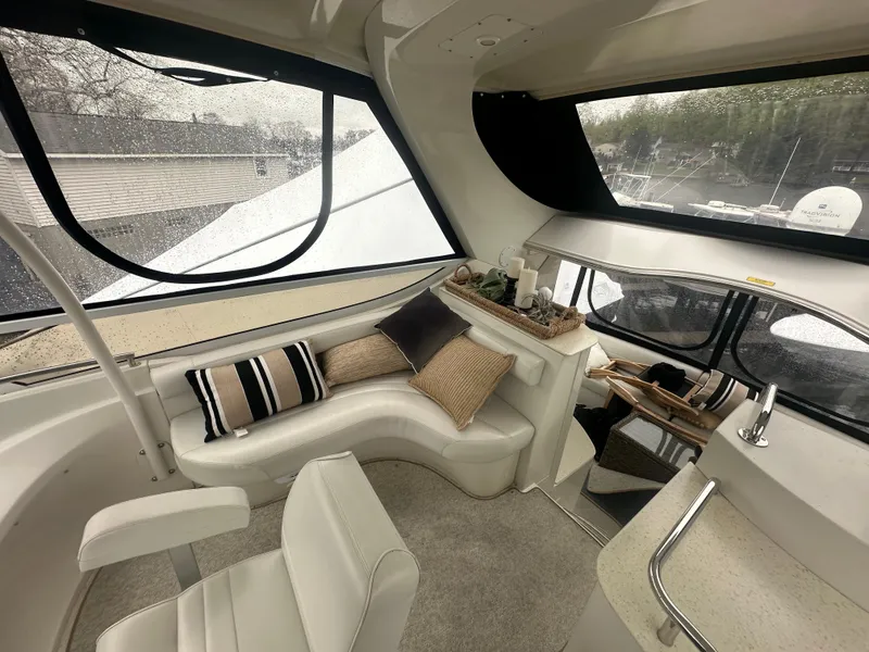 Slide: The Image of Luxurious interior of 2007 Carver 43 Motor Yacht with plush seating and elegant decor. - 12