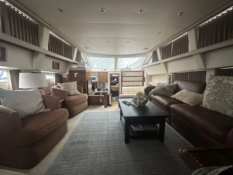 Slide: The Image of Luxurious interior of 2007 Carver 43 Motor Yacht with plush seating and elegant decor. - 25