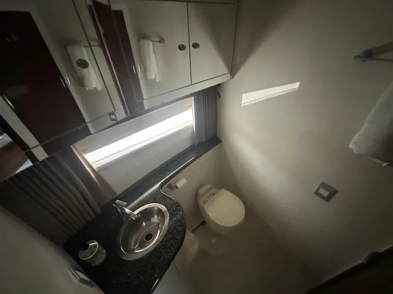 Slide: The Image of Bathroom interior of 2007 Carver 43 Motor Yacht with sink and toilet. - 30