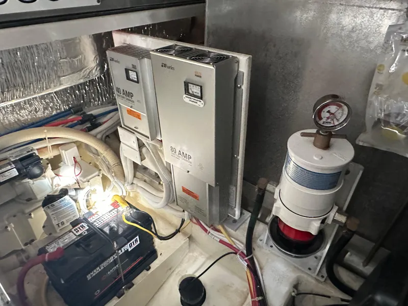 Slide: The Image of Engine room of 2007 Carver 43 Motor Yacht with battery and electrical components. - 44