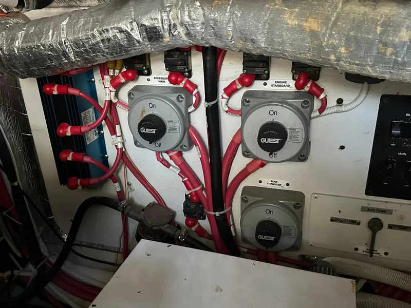 Slide: The Image of Electrical panel with switches and wiring in a 2007 Carver 43 Motor Yacht. - 47