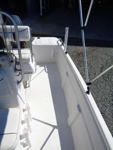 Slide: The Image of 2005 Sea Chaser 1800 RG boat interior with seating and storage. - 10