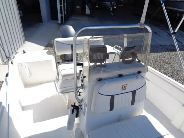 Slide: The Image of 2005 Sea Chaser 1800 RG boat interior with steering console and seating. - 16
