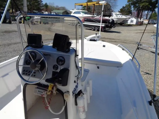 Slide: The Image of 2005 Sea Chaser 1800 RG boat interior with steering console and navigation equipment. - 17