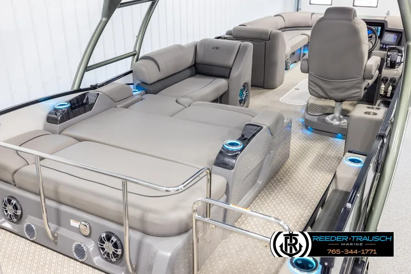 Slide: The Image of 2022 Avalon Catalina VRB pontoon boat interior with plush seating and modern amenities. - 11