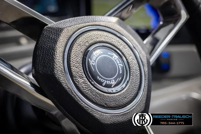 Slide: The Image of Steering wheel of 2022 Avalon Catalina VRB boat, featuring Reeder-Trausch Marine logo. - 29