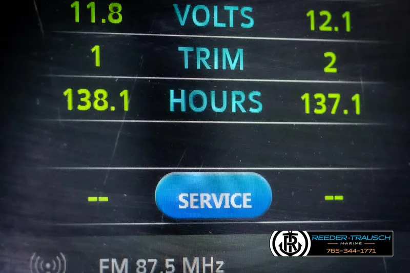 Slide: The Image of Dashboard display of Avalon Catalina VRB 2022 showing volts, trim, hours, and service button. - 33