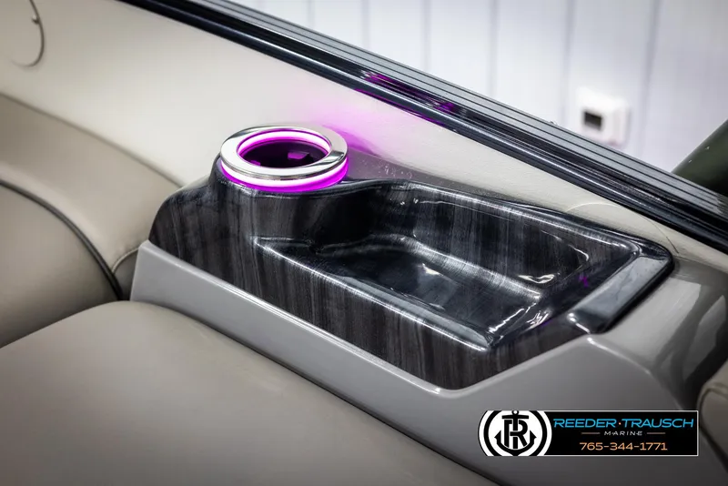 Slide: The Image of 2022 Avalon Catalina VRB interior with illuminated cup holder and sleek design. - 42