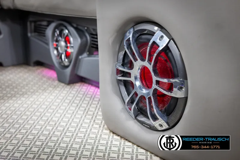 Slide: The Image of 2022 Avalon Catalina VRB boat interior with stylish red speakers and patterned flooring. - 45