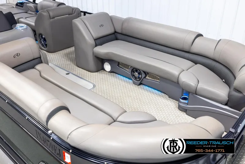 Slide: The Image of 2022 Avalon Catalina VRB boat interior with luxurious seating and ambient lighting. - 8