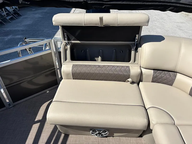 Slide: The Image of 2025 Sun Tracker Party Barge 20 DLX pontoon boat with open storage compartment. - 23