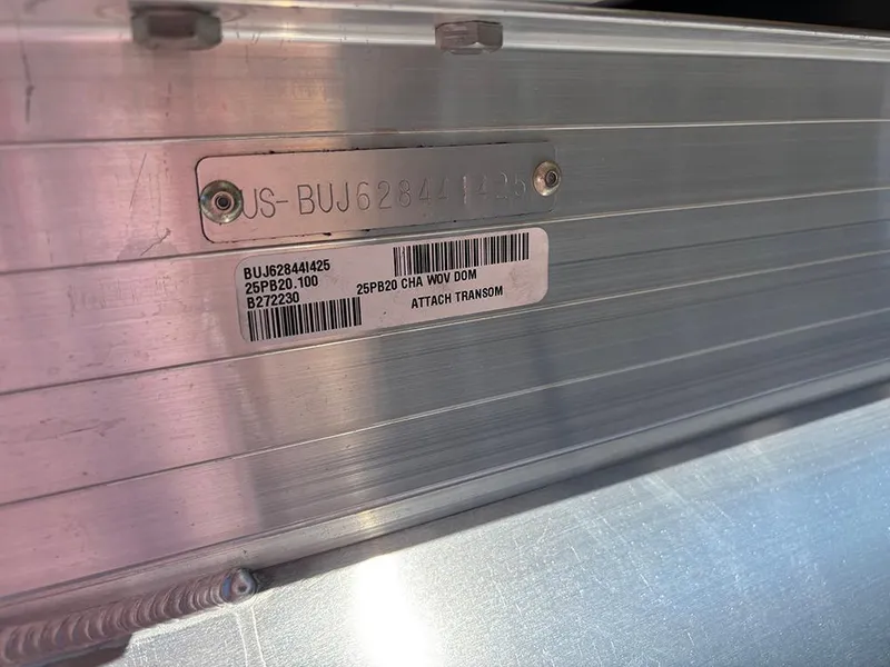 Slide: The Image of 2025 Sun Tracker Party Barge 20 DLX identification plate with serial and model numbers. - 28