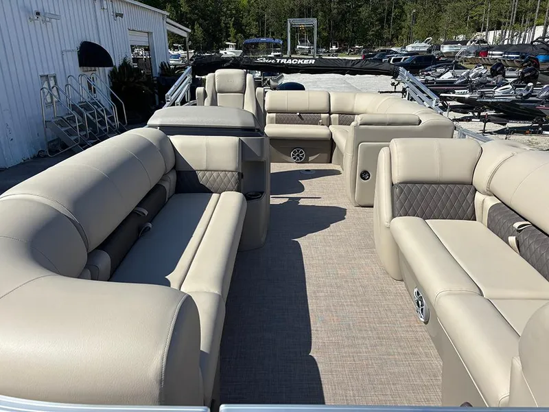 Slide: The Image of 2025 Sun Tracker Party Barge 20 DLX with spacious seating and modern design. - 8