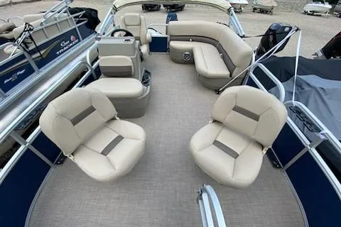 Slide: The Image of 2025 Sun Tracker Bass Buggy 16 XL Select pontoon boat with spacious seating and modern design. - 8
