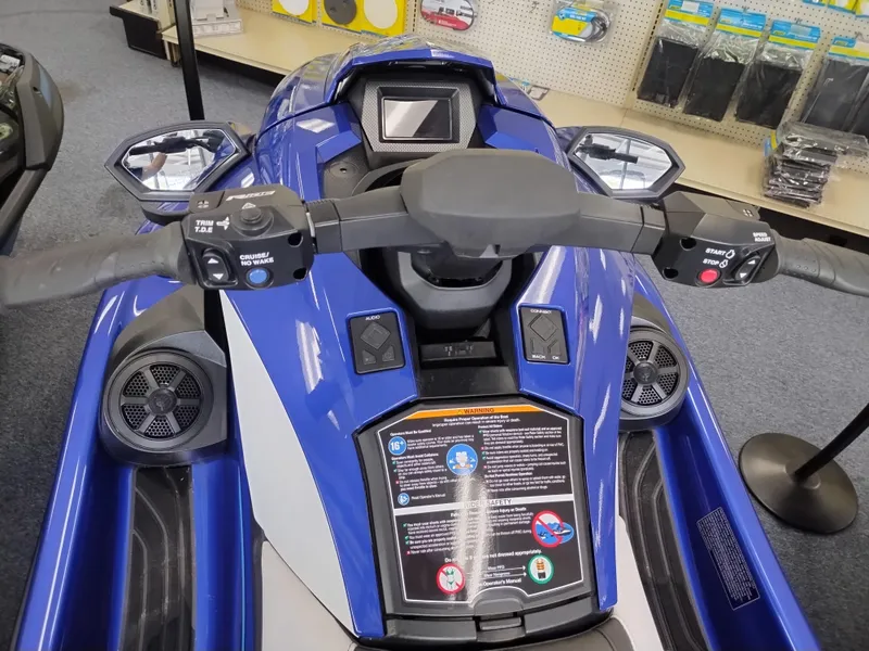 Slide: The Image of 2024 Yamaha WaveRunner GP SVHO, blue jet ski dashboard with controls and display. - 7