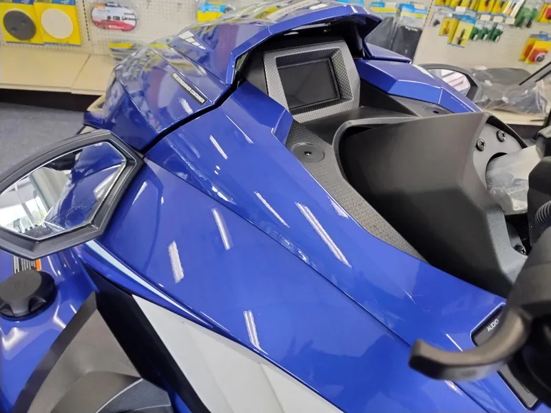 Slide: The Image of 2024 Yamaha WaveRunner GP SVHO, blue, dashboard view in showroom setting. - 8