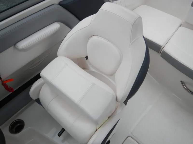 Slide: The Image of White seating in 2021 Chaparral 21 SSi OB boat interior. - 24