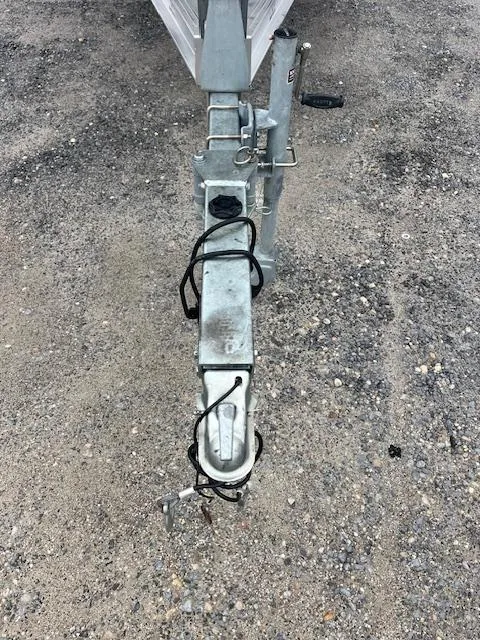 Slide: The Image of Trailer hitch of a 2021 Chaparral 21 SSi OB on gravel surface. - 3