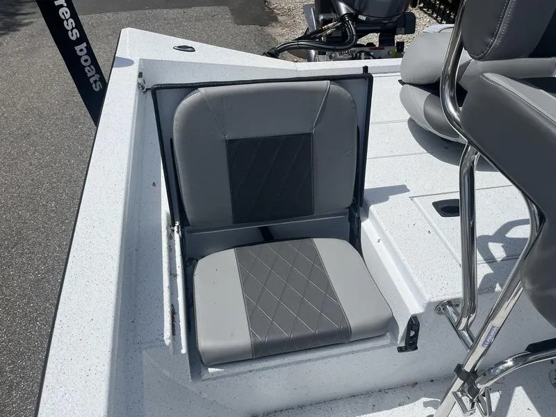 Slide: The Image of 2025 Xpress H20B boat seat with gray upholstery and diamond stitching. - 16