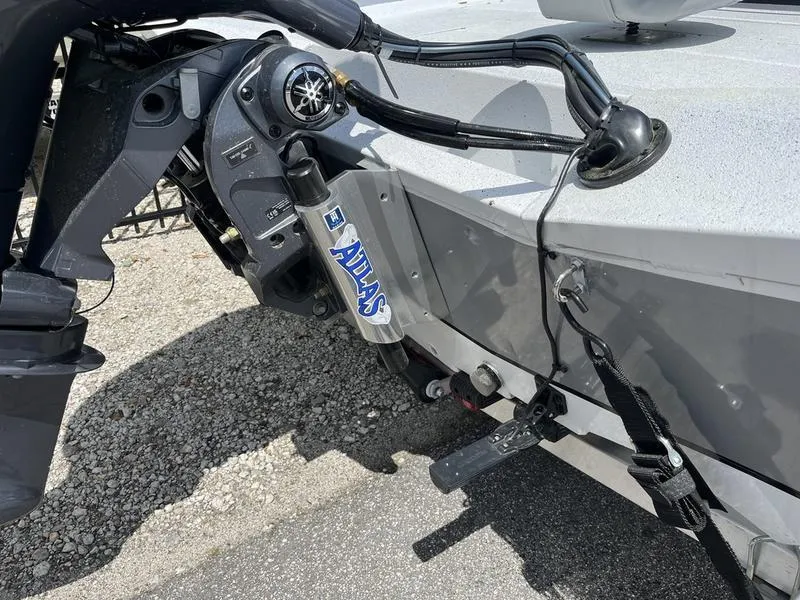 Slide: The Image of 2025 Xpress H20B boat with Atlas hydraulic jack plate and motor mount. - 18