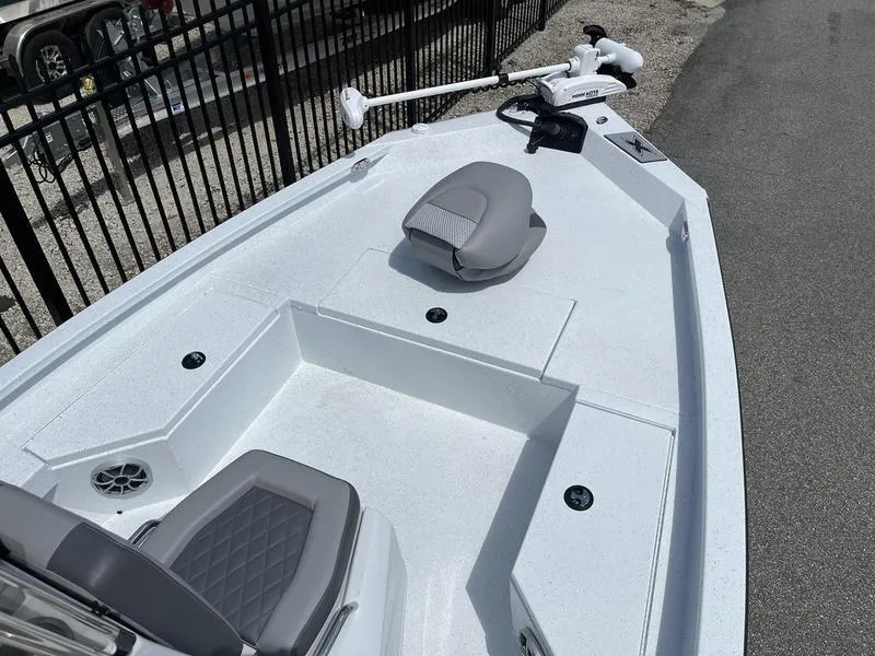 Slide: The Image of 2025 Xpress H20B boat deck with seating and trolling motor, viewed from above. - 4